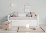 Compact bed with sliding lower bed