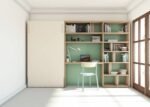 Student residence with a folding bed and a study area with a bookcase