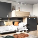 Horizontal folding bed with another elevated bed on the wardrobe