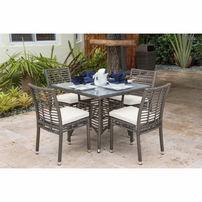 Luckman rattan dining set, 4 chairs and a table - Image 1