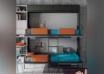 Youth room with horizontal folding bunk bed and study area.